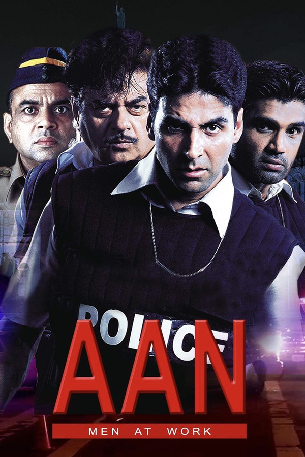 IN - Aan: Men at Work (2004)